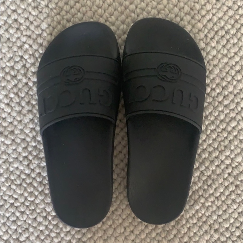 Black Gucci slides